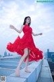 Beauty Crystal Lee ventured into blooming on the roof of a high-rise building (8 photos) P4 No.a1f8a4